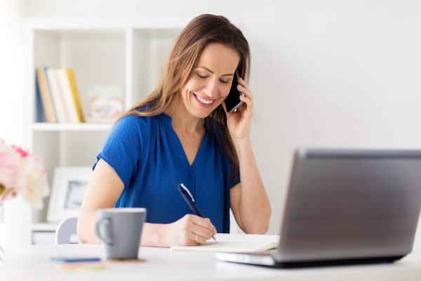 woman-with-notepad-calling-on-smartphone-at-P4USRMY.jpg woman-with-notepad-calling-on-smartphone-at-P4USRMY.jpg